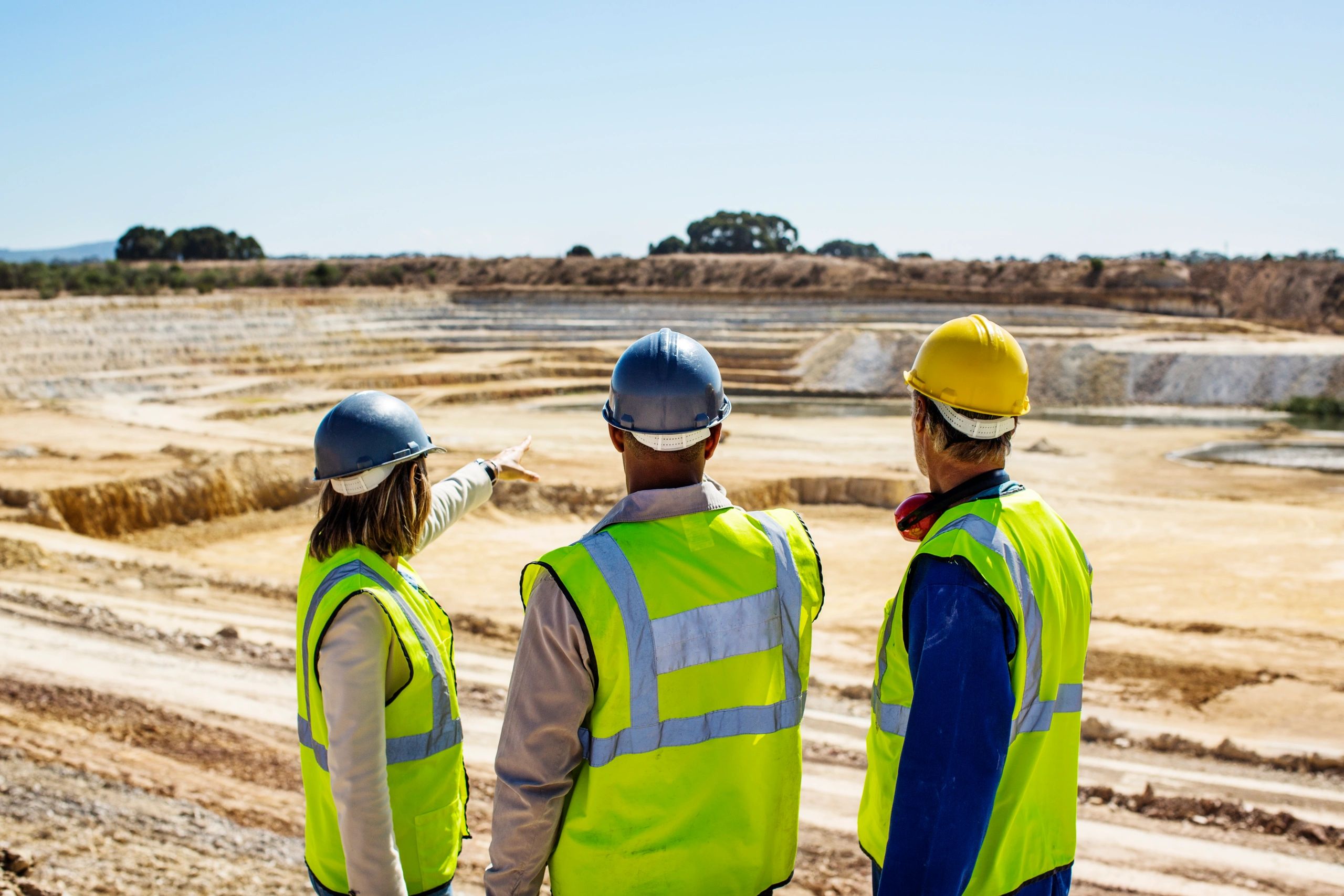Field team examining conditions at a quarry site